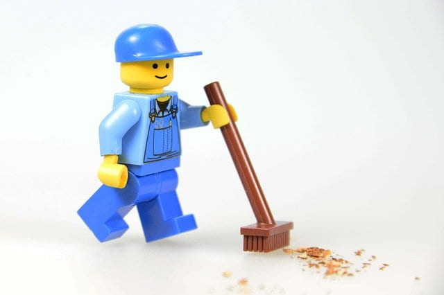lego person sweeping