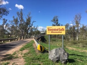Welcome to Toomelah sign on the way into the community. 