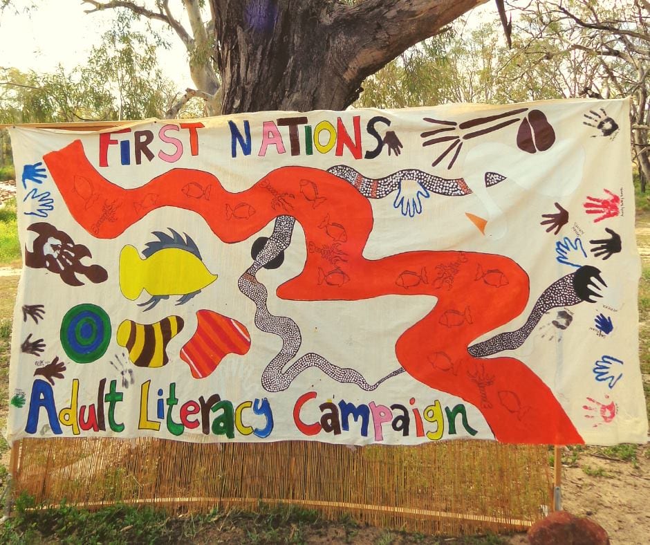 Colourful banner reading 'First Nations Adult Literacy Campaign'.