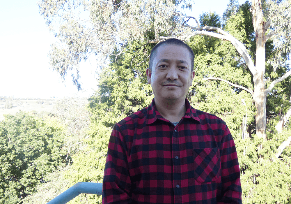 Portrait image of Kaka, UNE education PhD candidate from Bhutan
