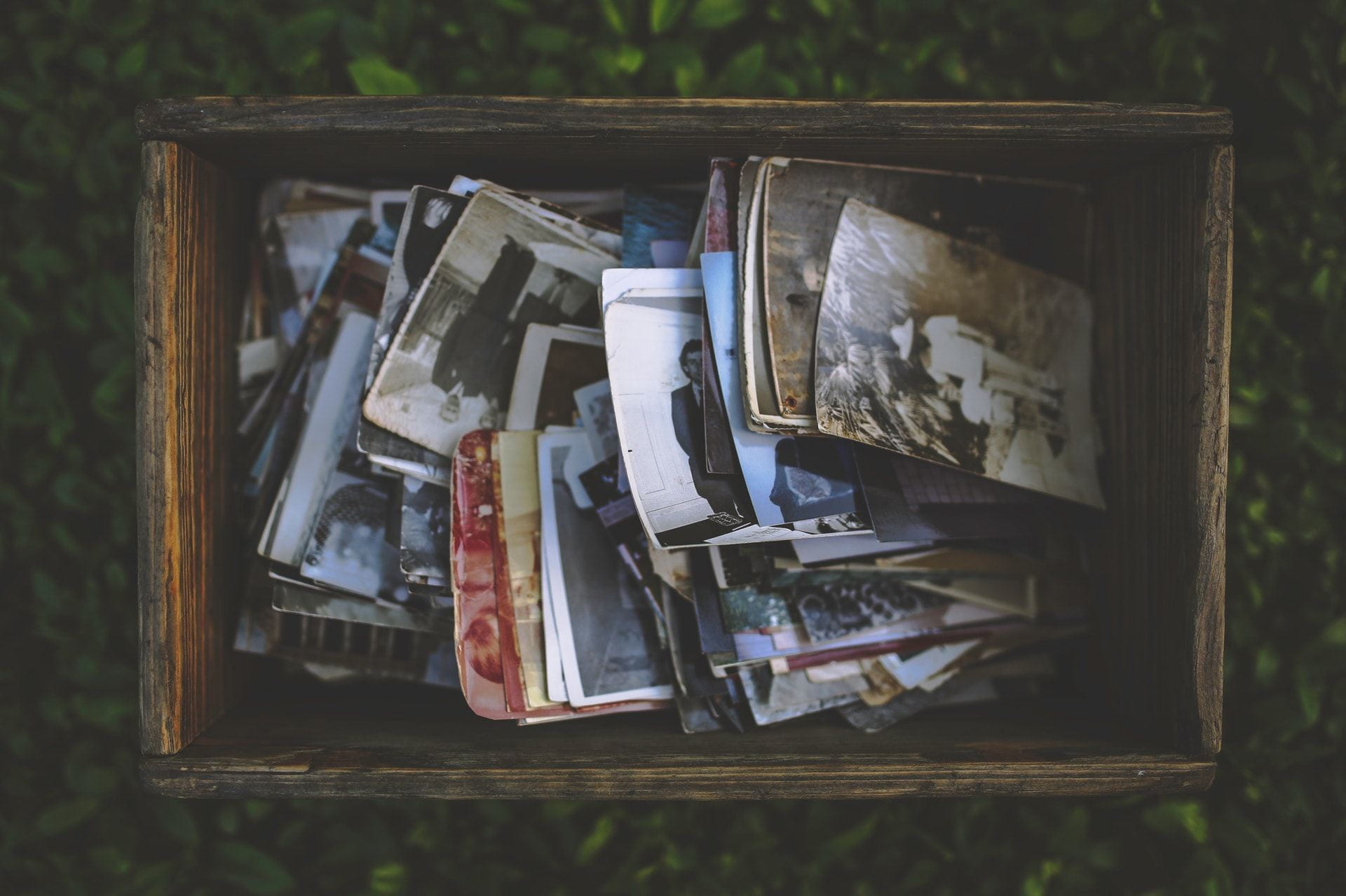 Antique wooden box of old photographs
