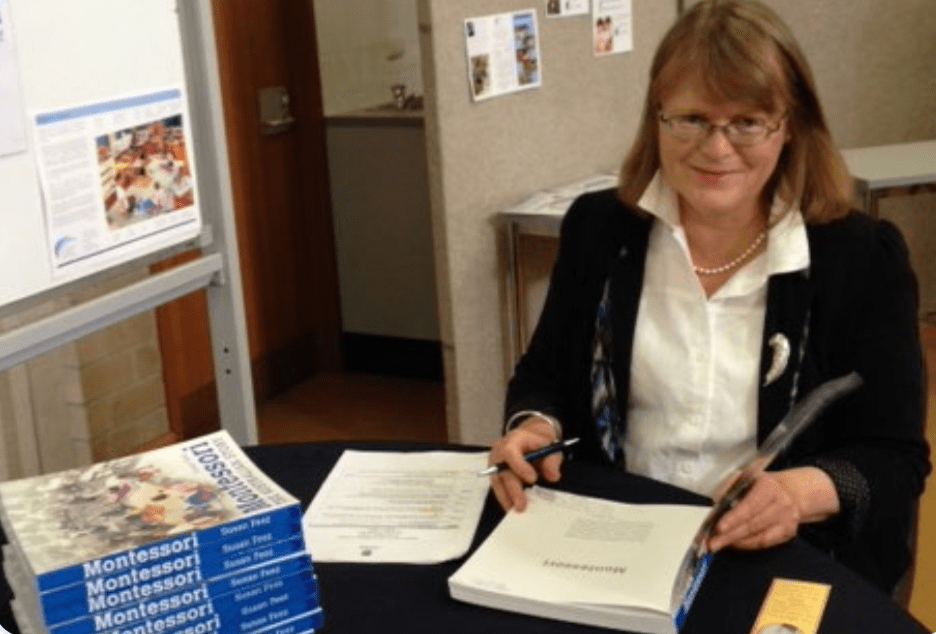 Susan Feez signing copies of one of her books as an early childhood expert