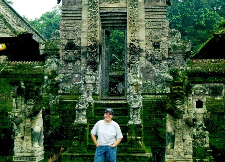 UNE history student Nanette Reid stands in front of historic ruins on her travels around Asia.