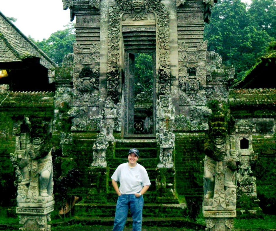 UNE history student Nanette Reid stands in front of historic ruins on her travels around Asia.