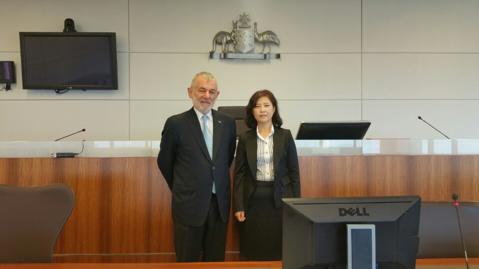 Lisa Chong with Paul Akon in the Moot Court