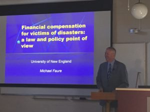 Professor Michael Faure delivering a Kirby Seminar at UNE 