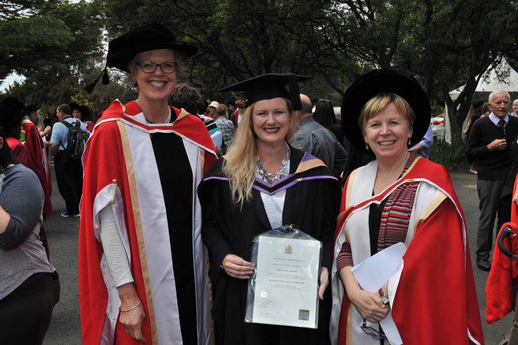 Kylie Howlett - grad with Lou and Alison