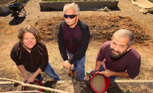 Kate Wright, Steve Widders, and Rob Waters at the community garden